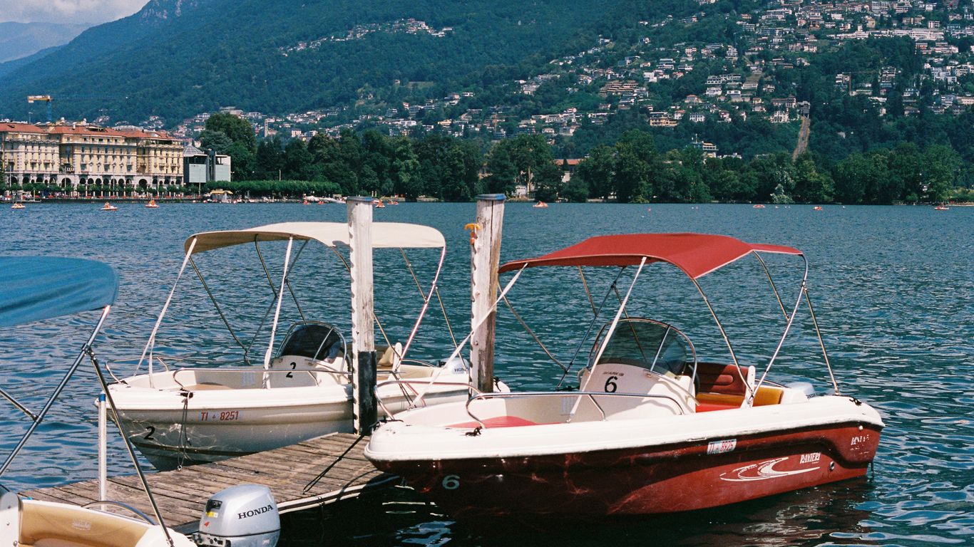 A couple of boats that are sitting in the water