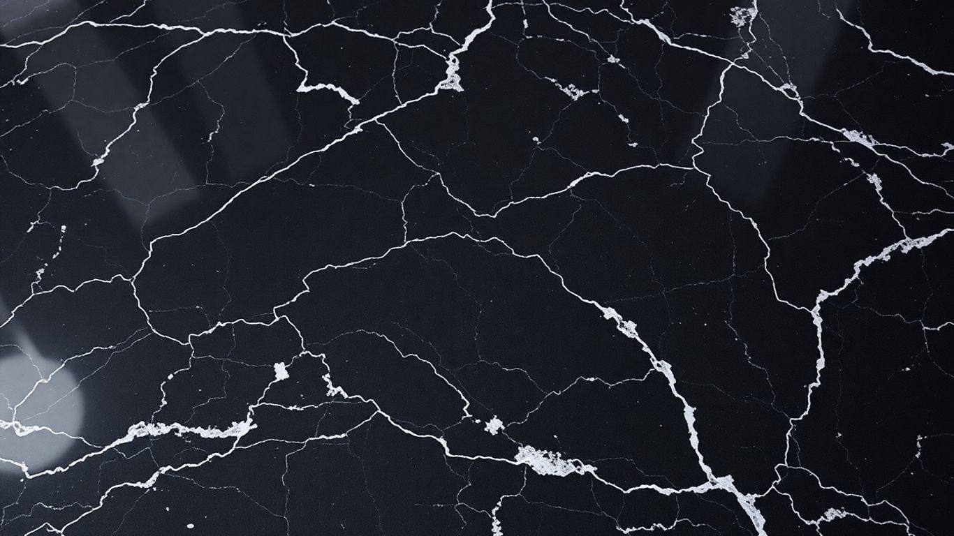 Polished Nero black marble countertop with elegant veining.