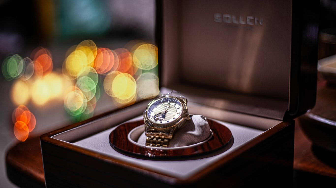 a watch sitting in a box on a table