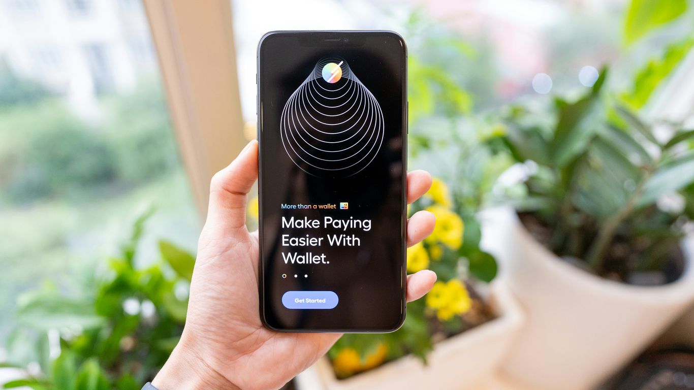 person holding black iphone 4