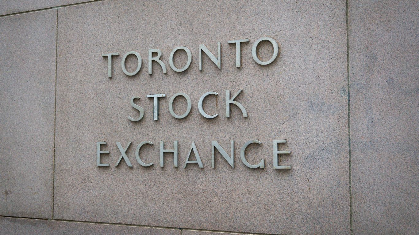 a sign on the side of a building that says toronto stock exchange