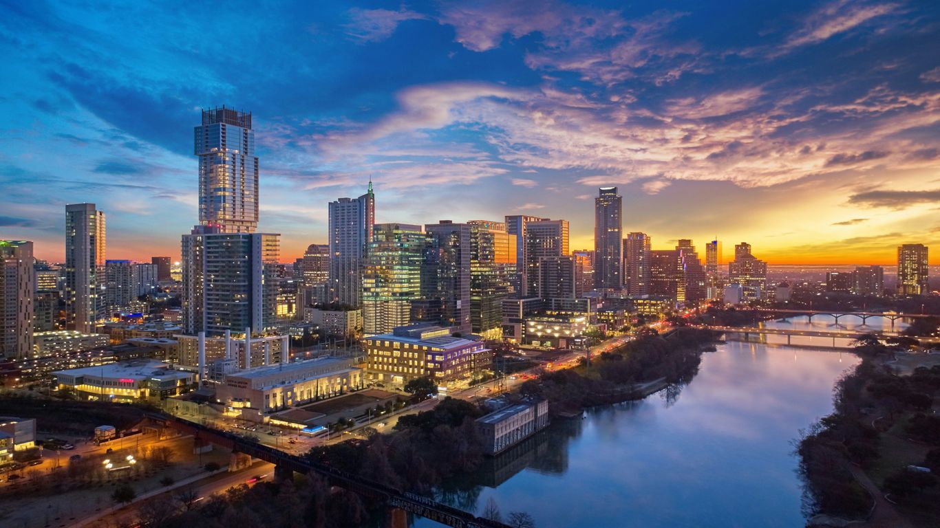a city skyline at sunset