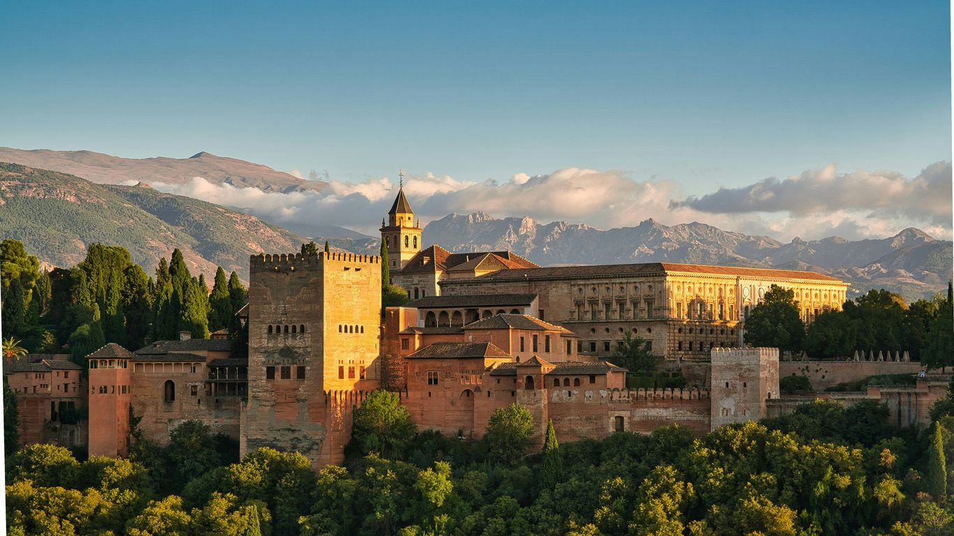a castle with a clock tower on top of it