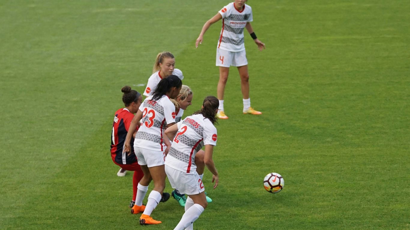 woman playing soccer