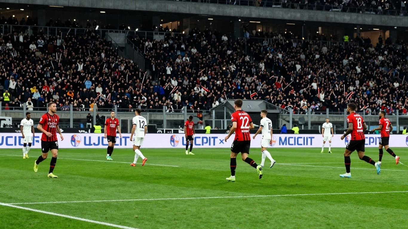 Milan football match action on the pitch.