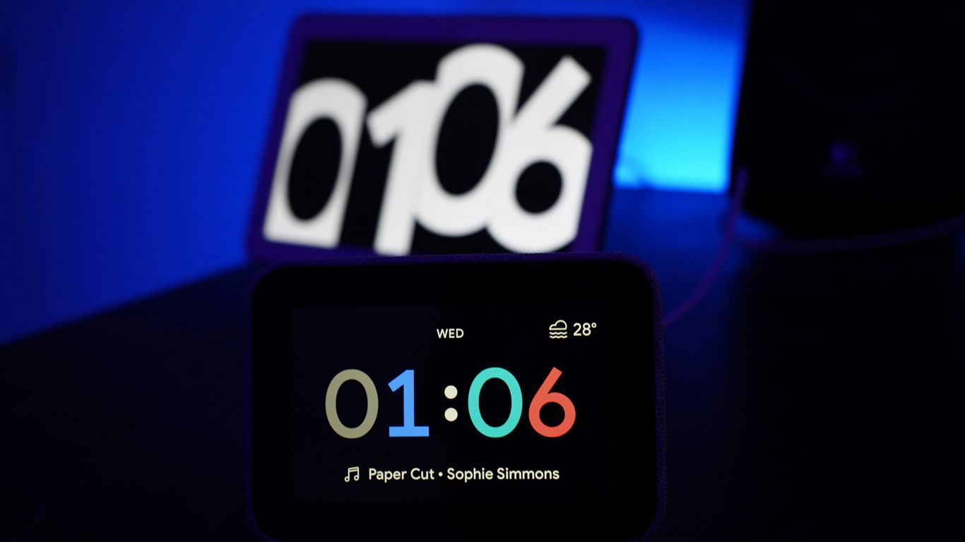 black digital clock at 1:06