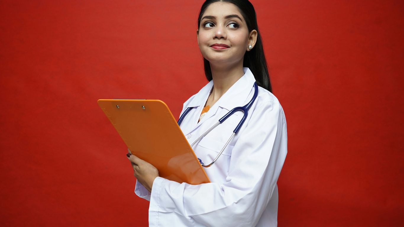 a person holding a laptop