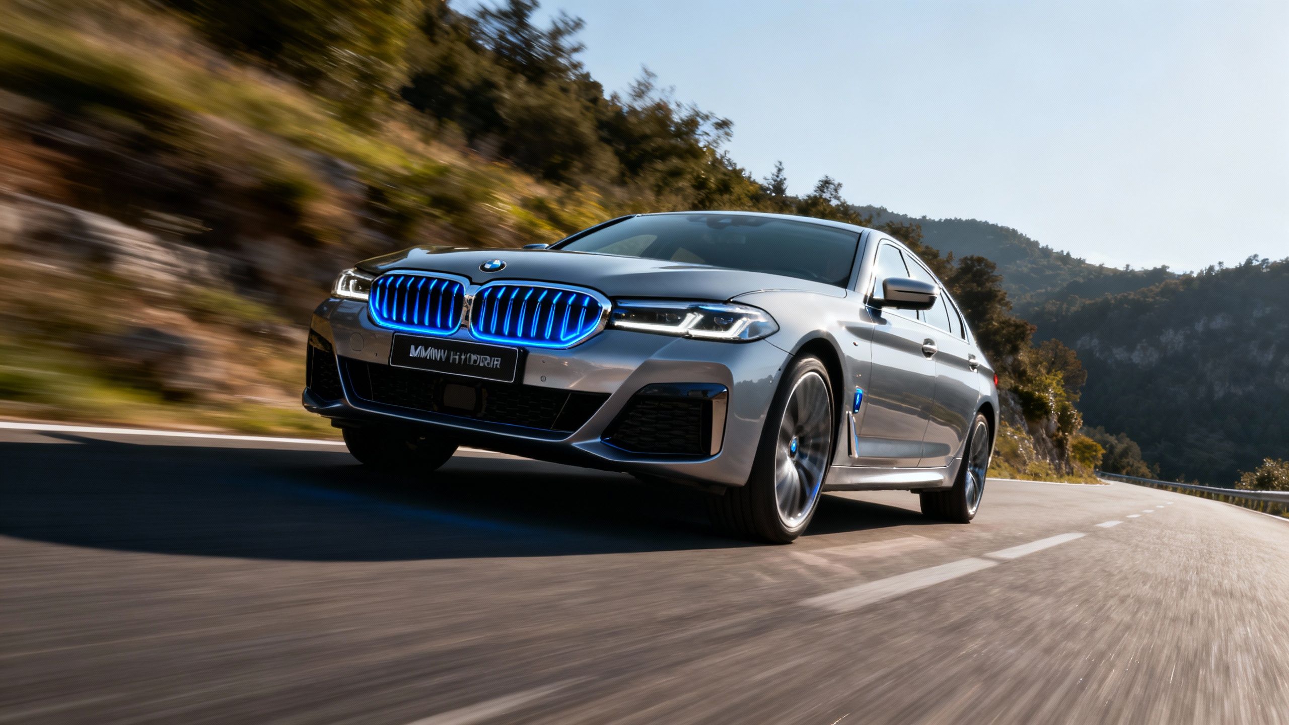 BMW 5 Series plug-in hybrid sedan on a road.