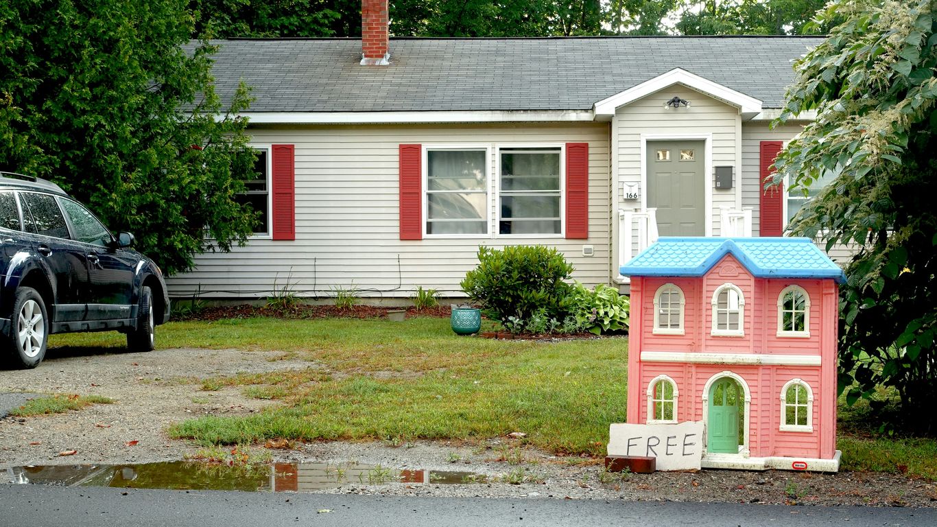 a house with a car parked in front of it