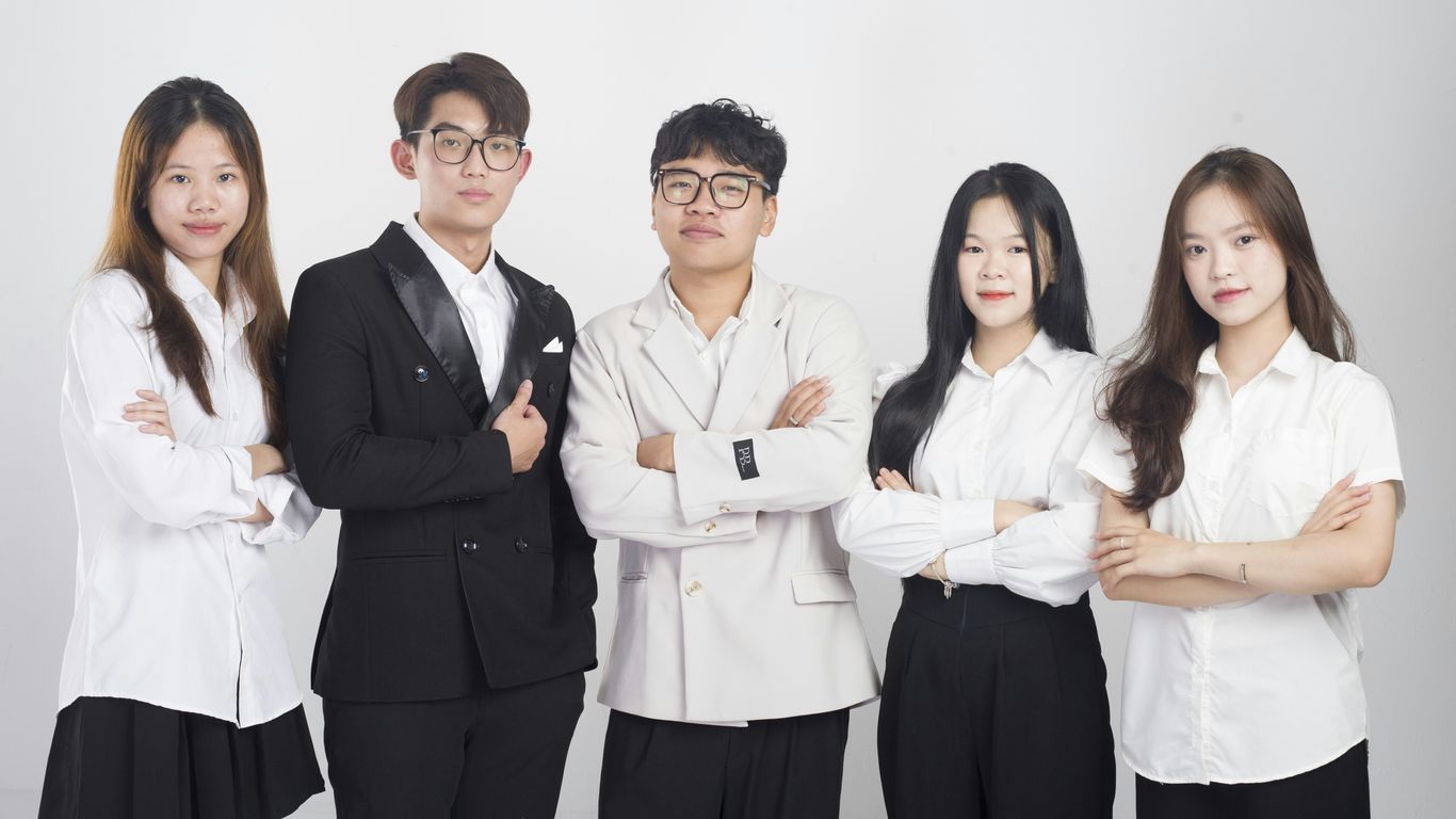 a group of people standing next to each other