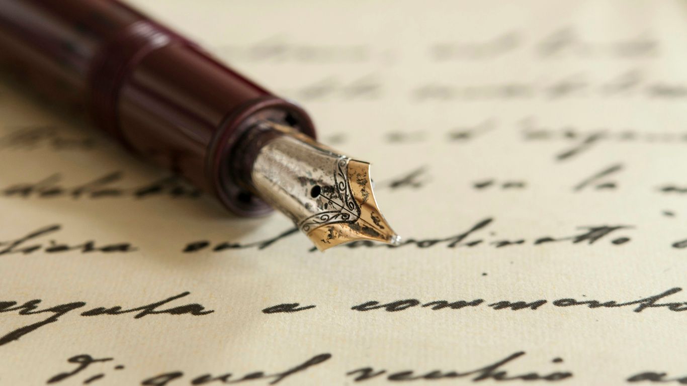 red pen on white paper