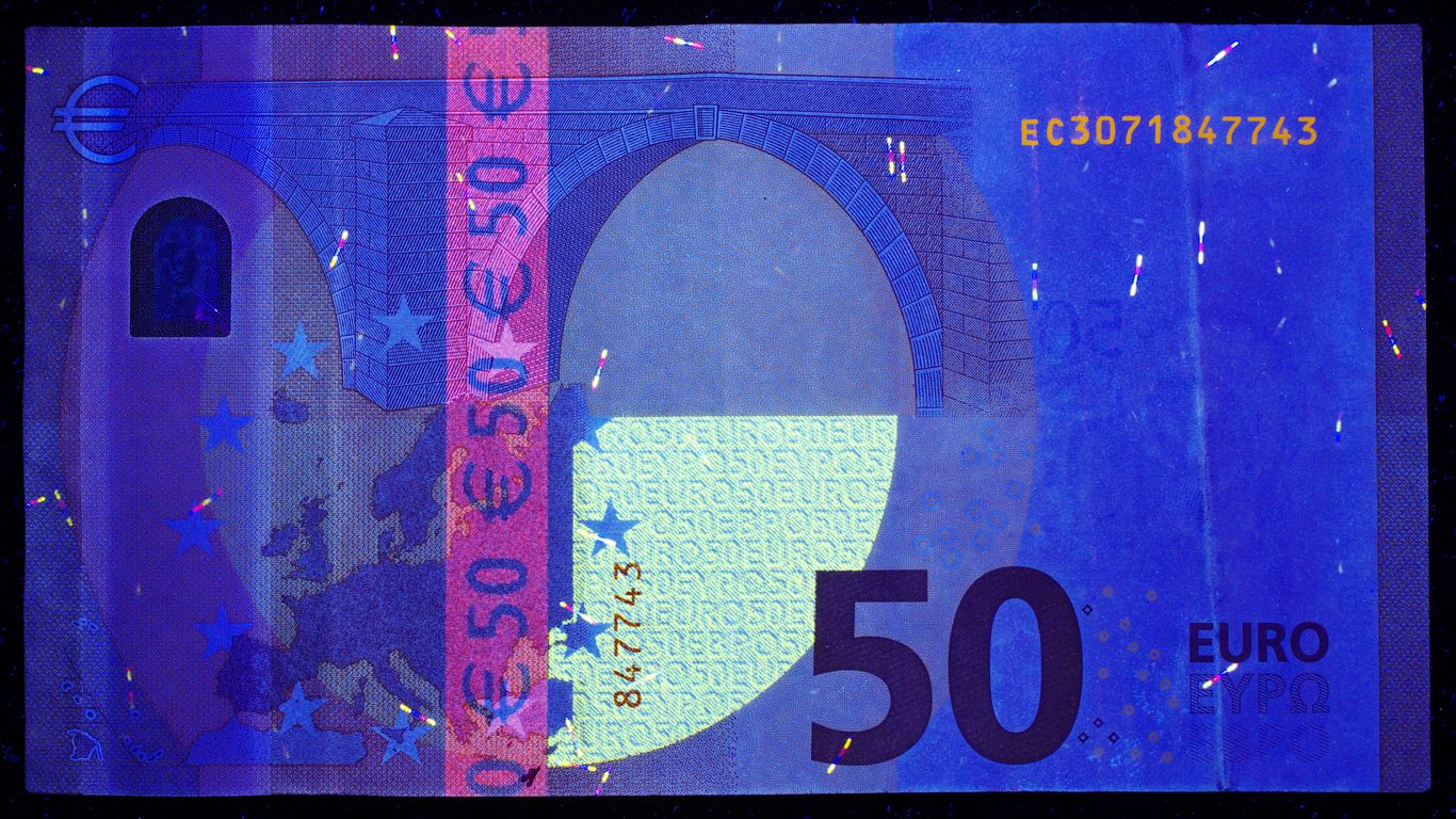 A 50 euros bill with a blue background