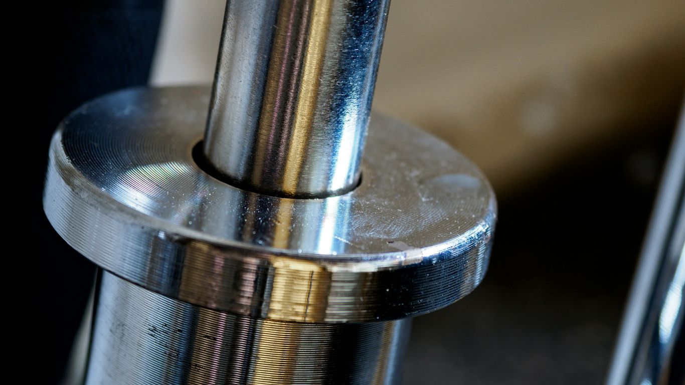 silver and gold steel tube