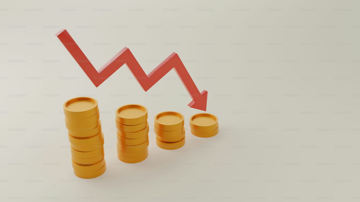 Declining trend illustrated with coins and a downward arrow.