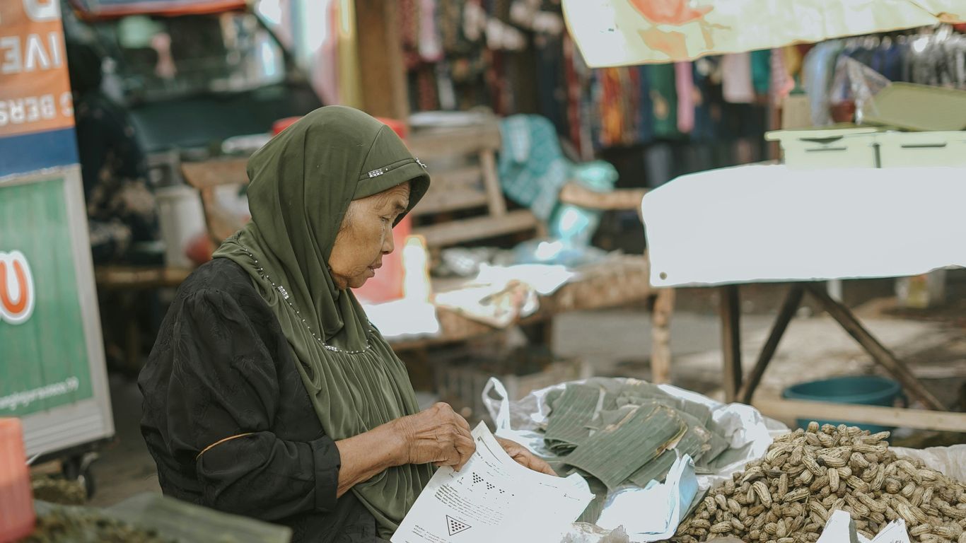 a person in a green head scarf