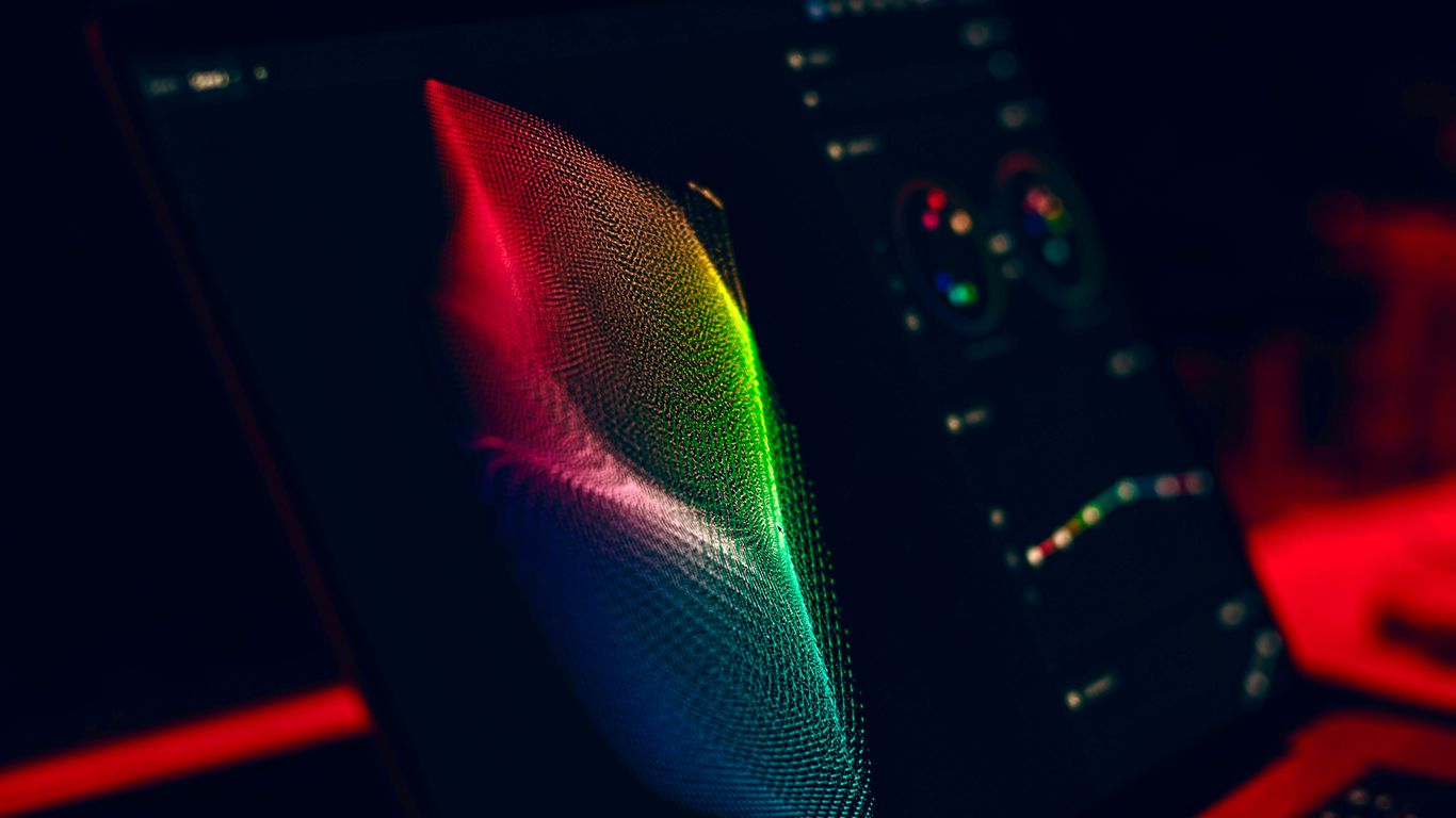 a close up of a laptop with a colorful screen