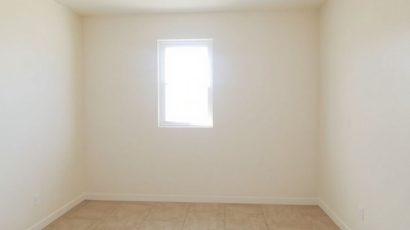 Newly painted condo interior with bright natural light.