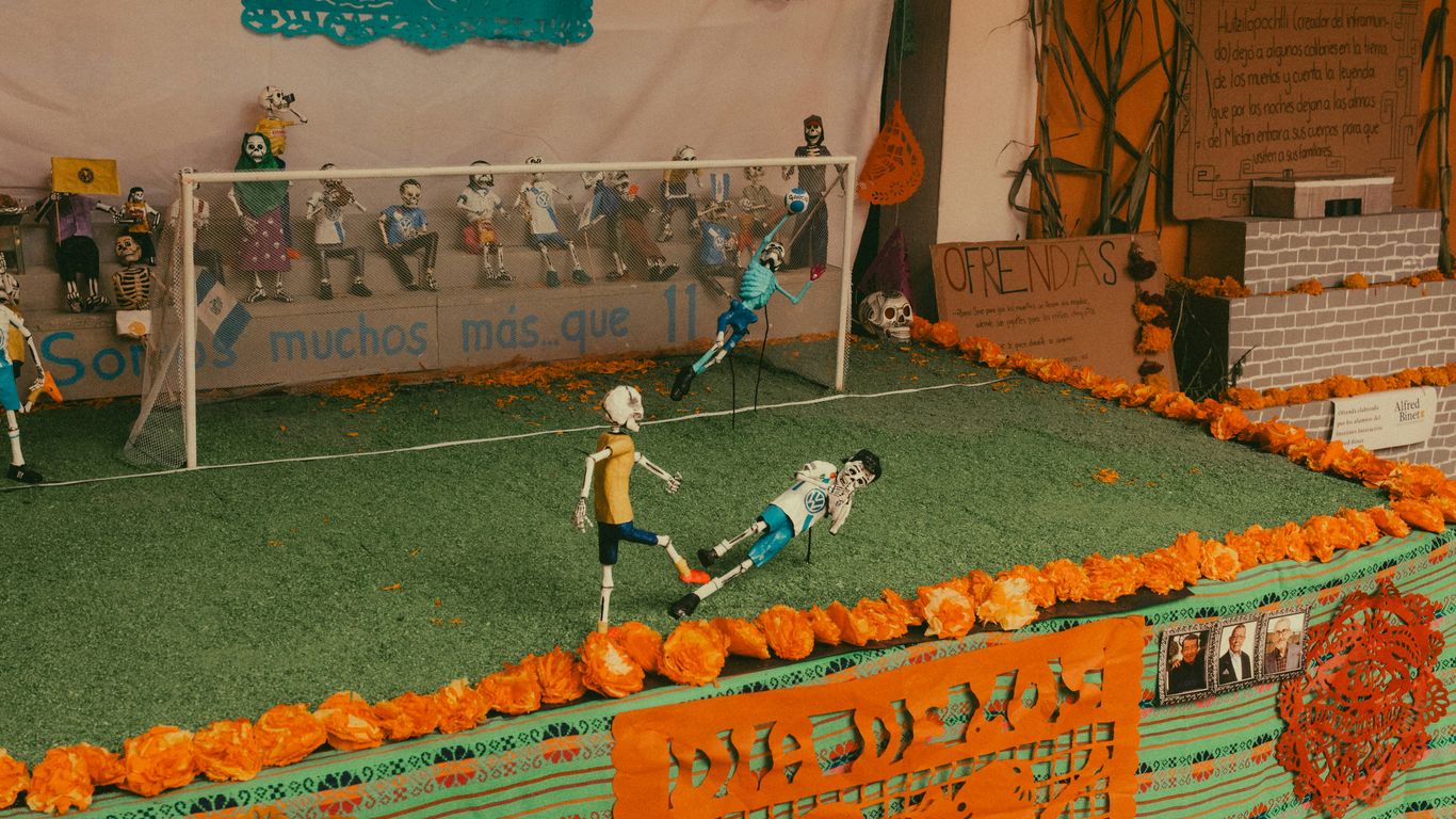 a group of people playing a game of soccer