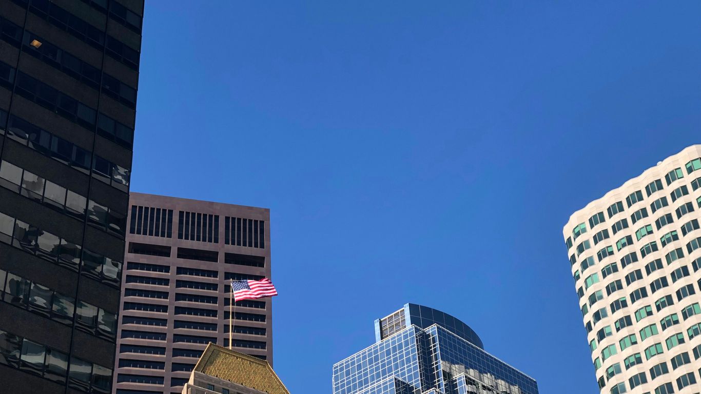 a group of tall buildings in a city