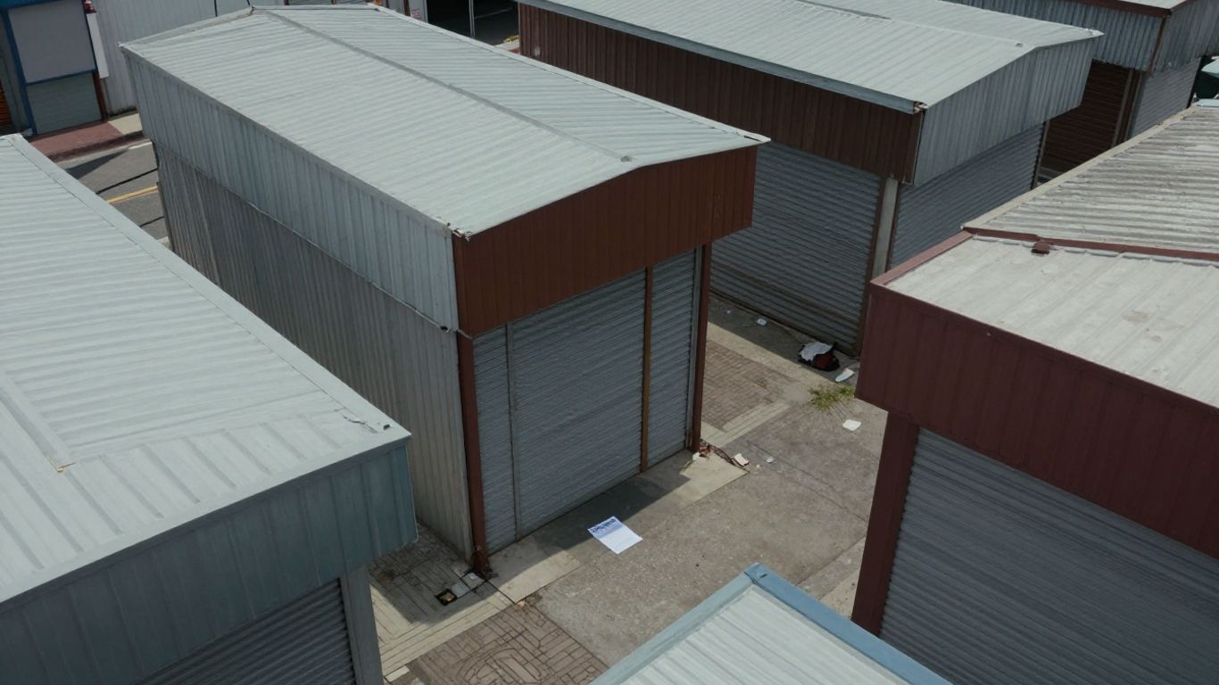 Closed small businesses with official document on ground.