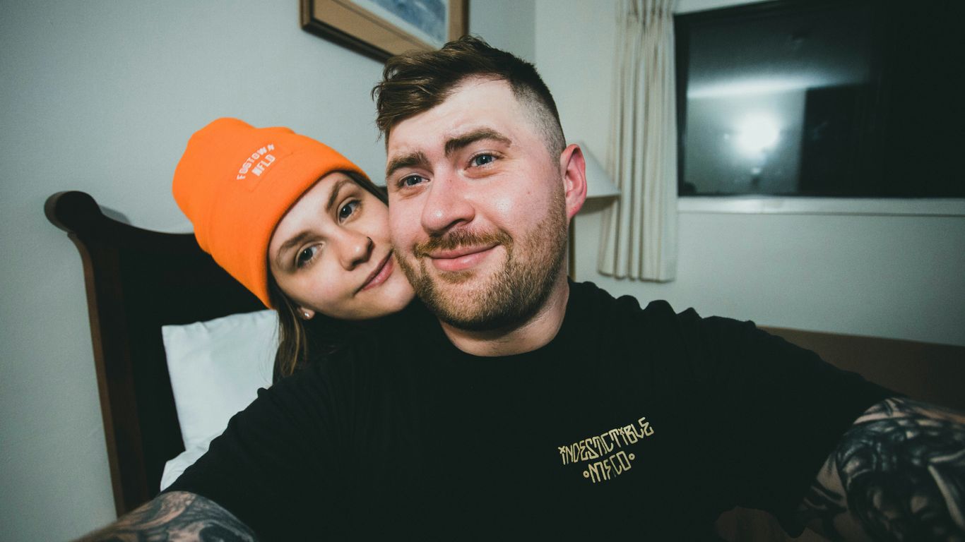 a man and a woman posing for a picture