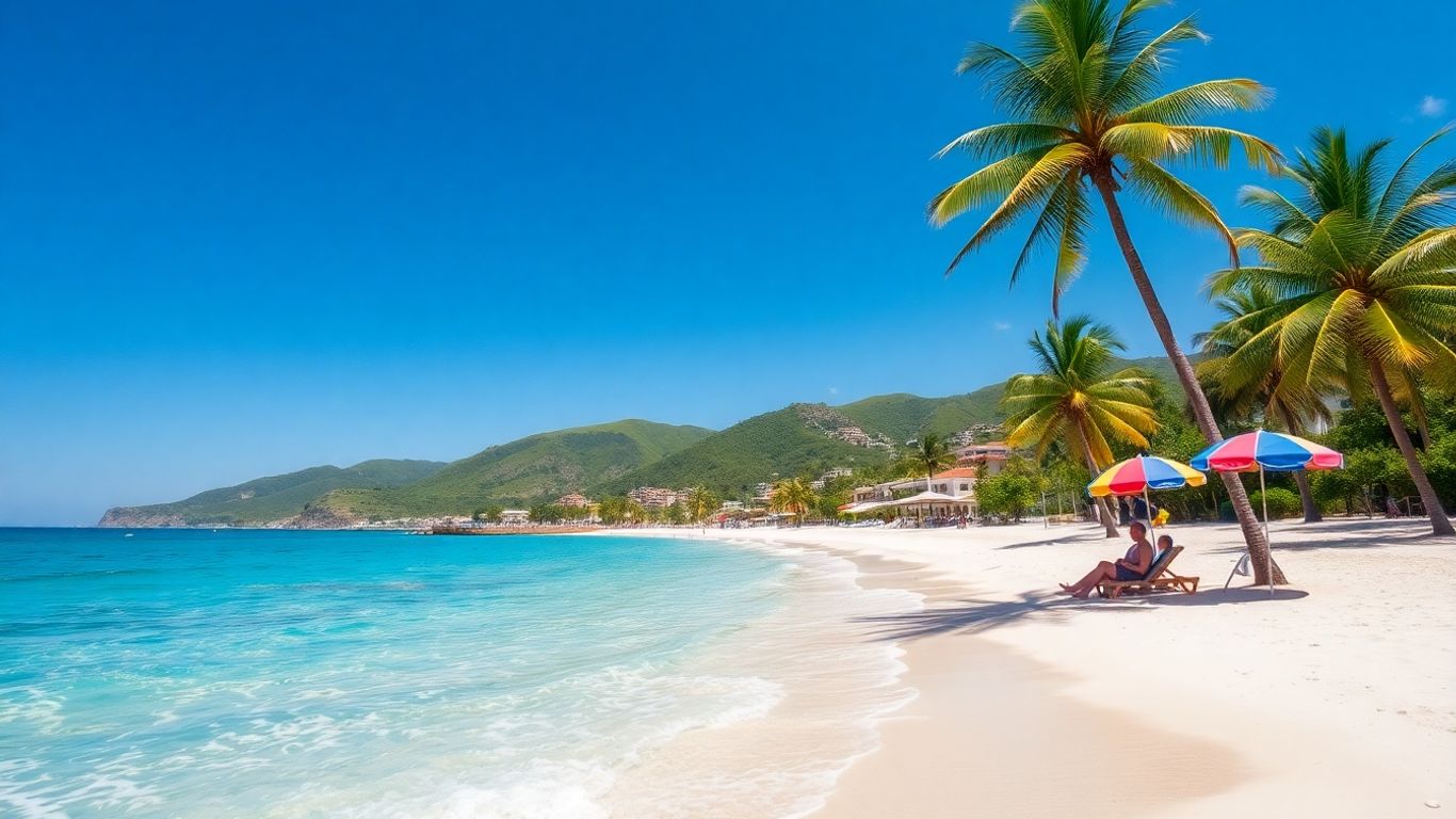 Tropical beach with palm trees and clear blue water.