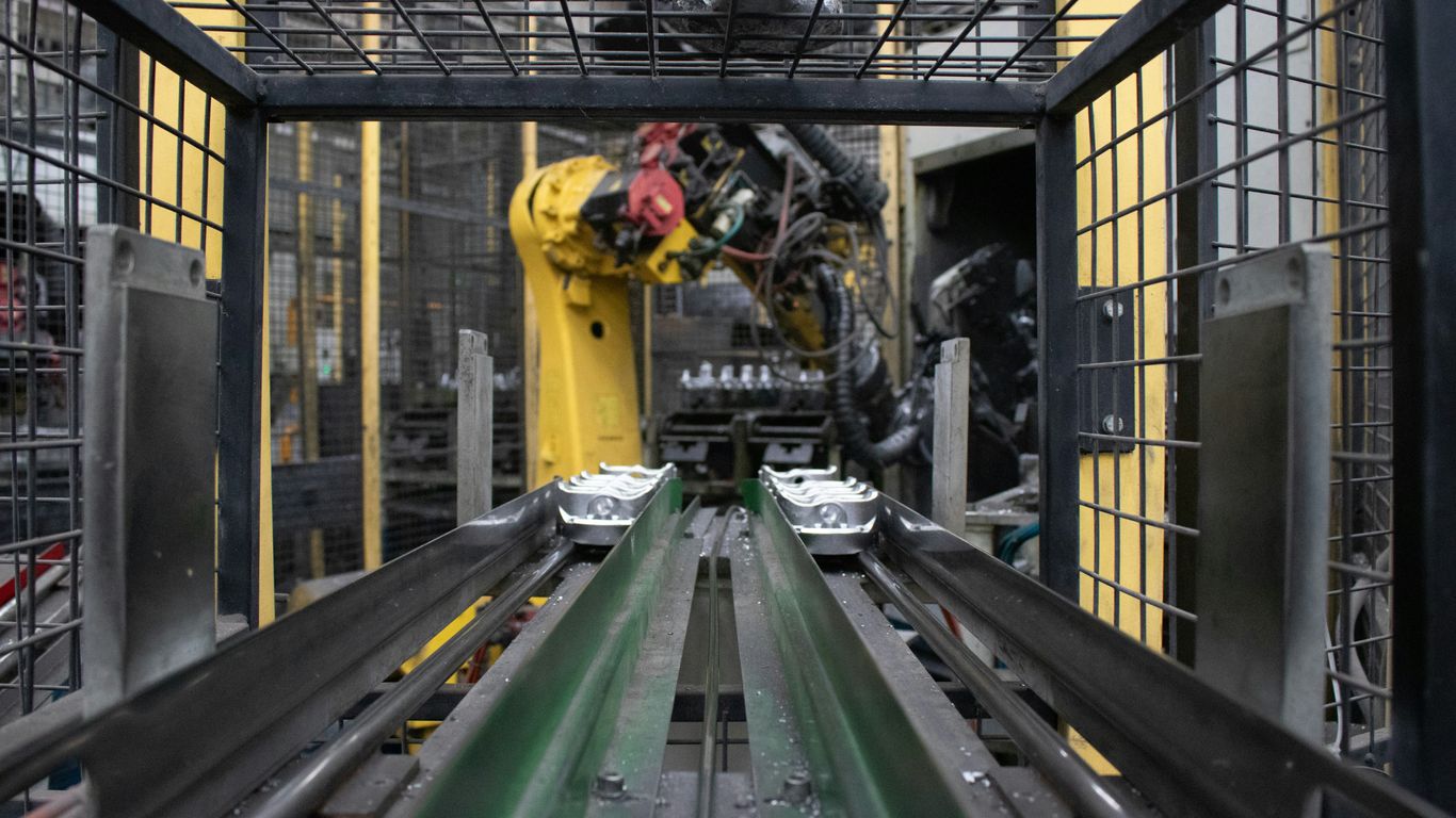 A machine is moving a conveyor belt in a factory