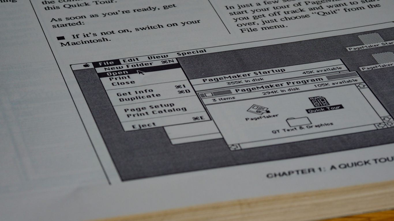 white printer paper on brown wooden table