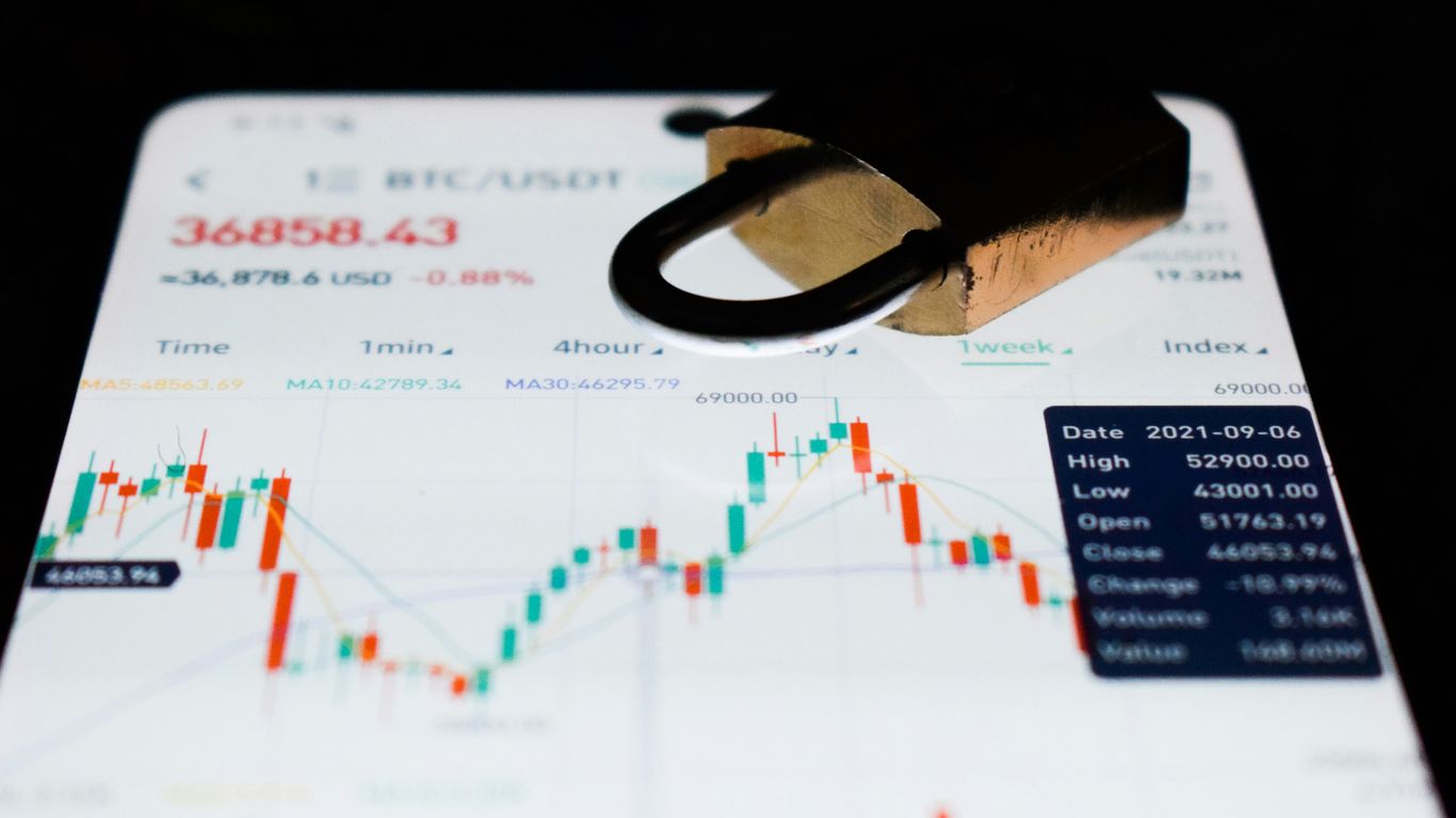a close up of a business card with a stock chart on it