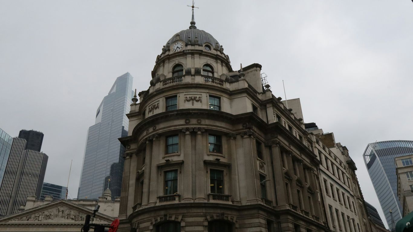 a large building with a clock on the top of it
