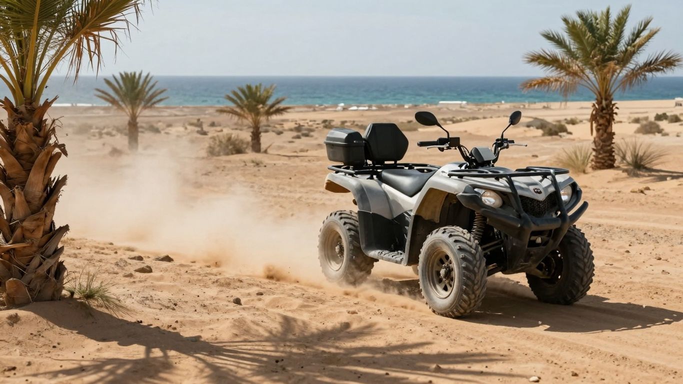 ATV on dusty desert trail with ocean view