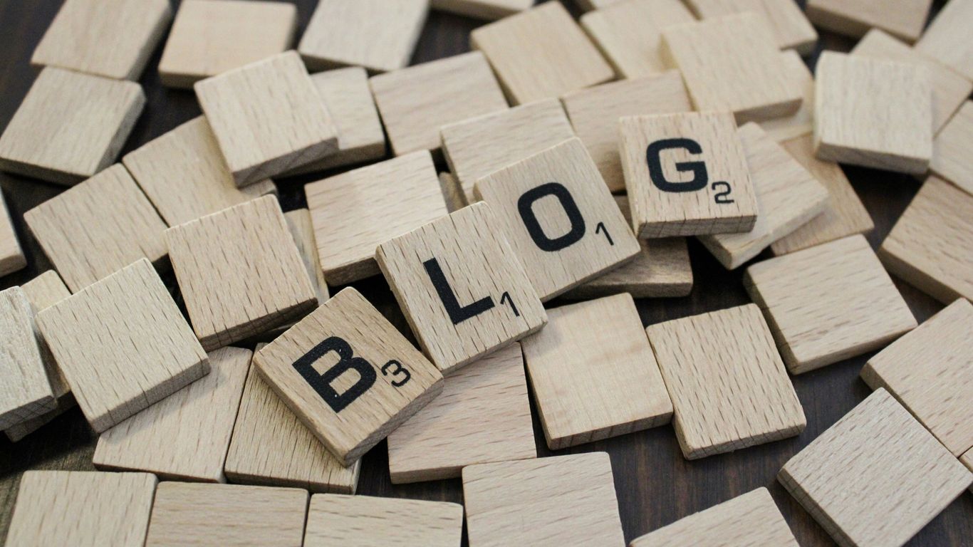 a pile of wooden blocks with the word blog spelled on them