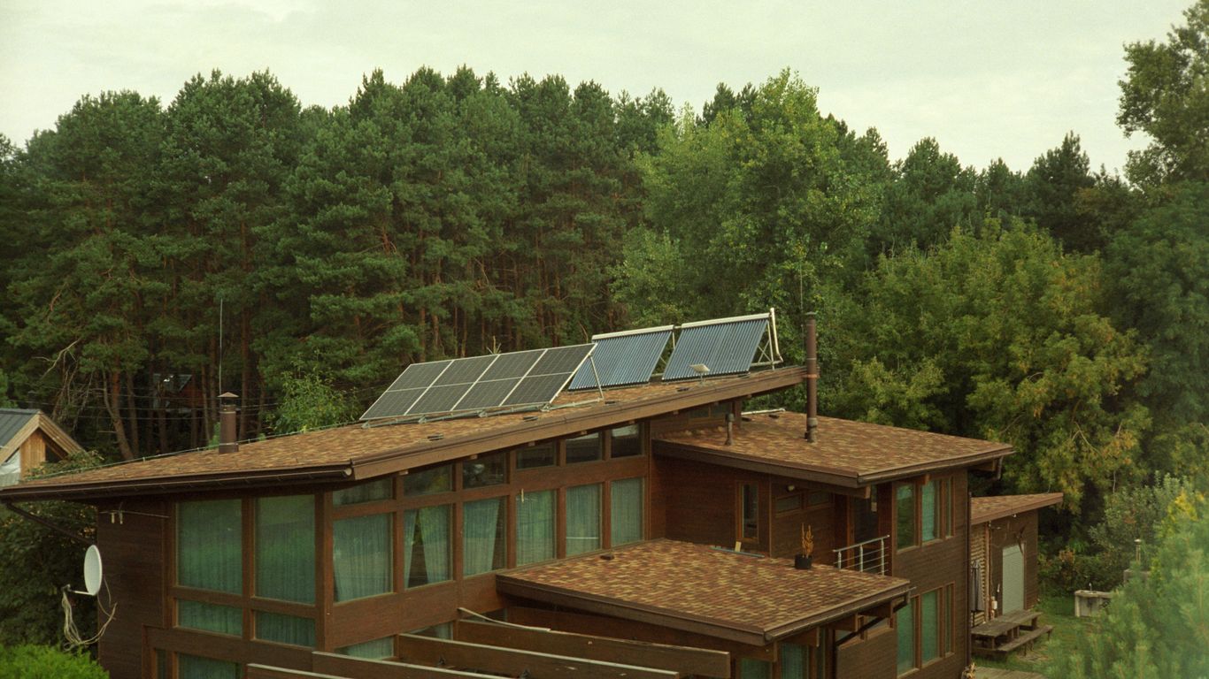 a house with a solar panel on the roof