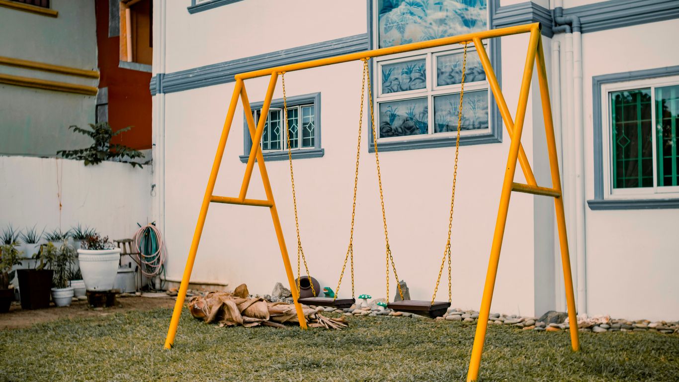 a yellow house being built