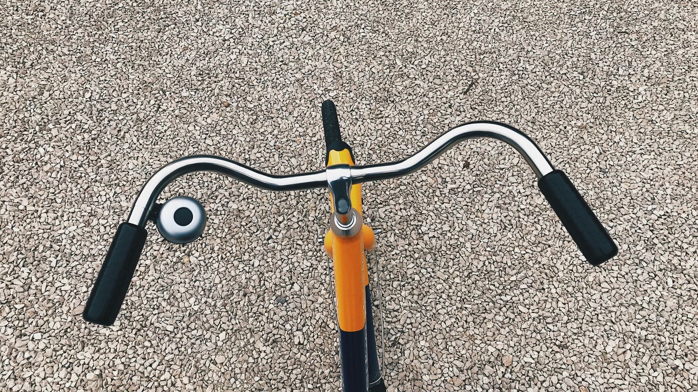 orange and black bicycle