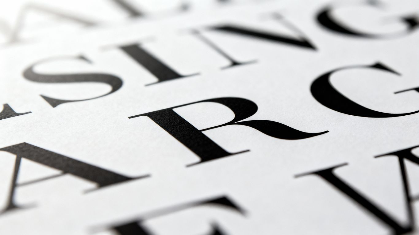 Elegant letterforms arranged artfully, showcasing typography.