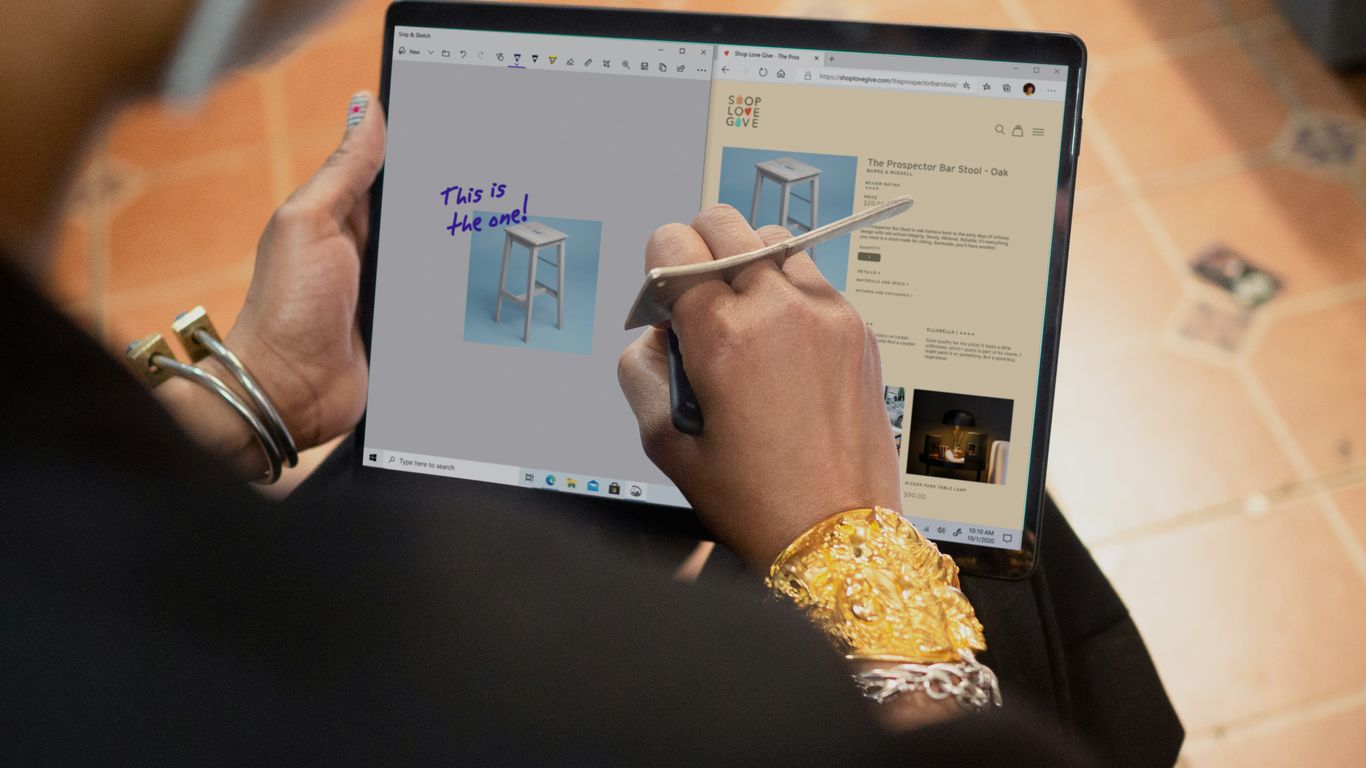 person using Surface computer on table