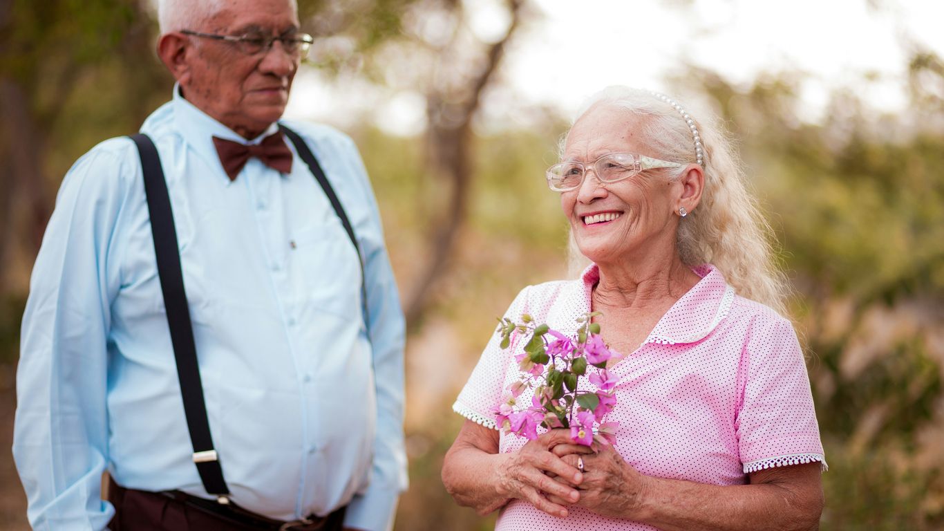 A man and a woman standing next to each other