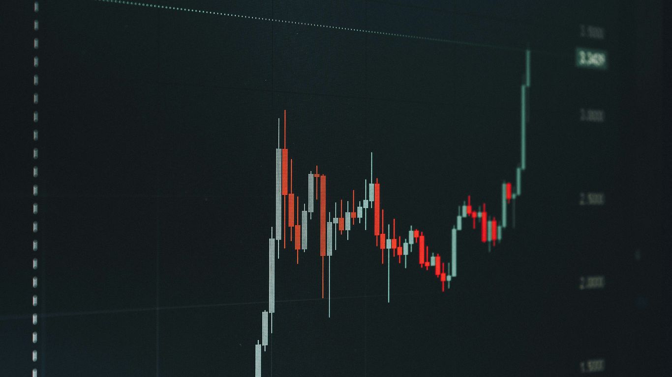 Stock market chart showing upward trend.