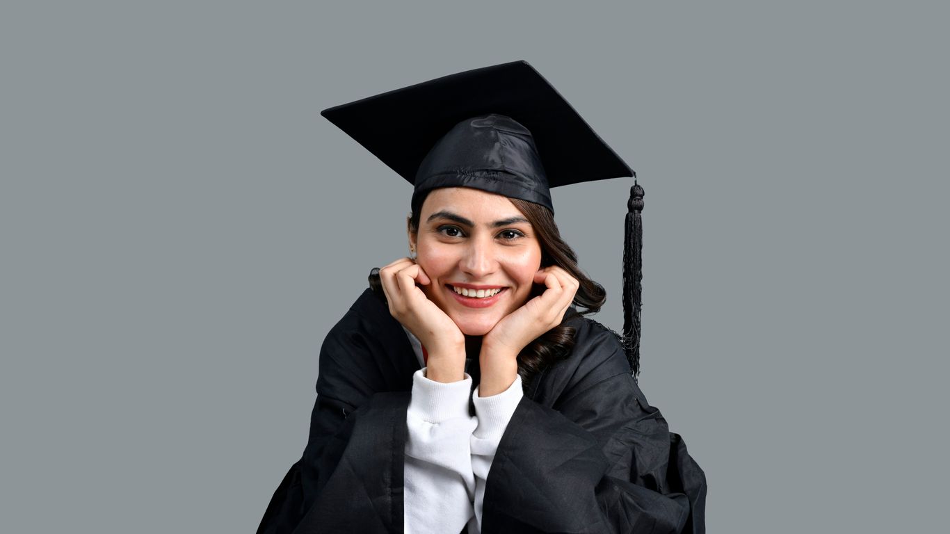 a person wearing a graduation cap and gown