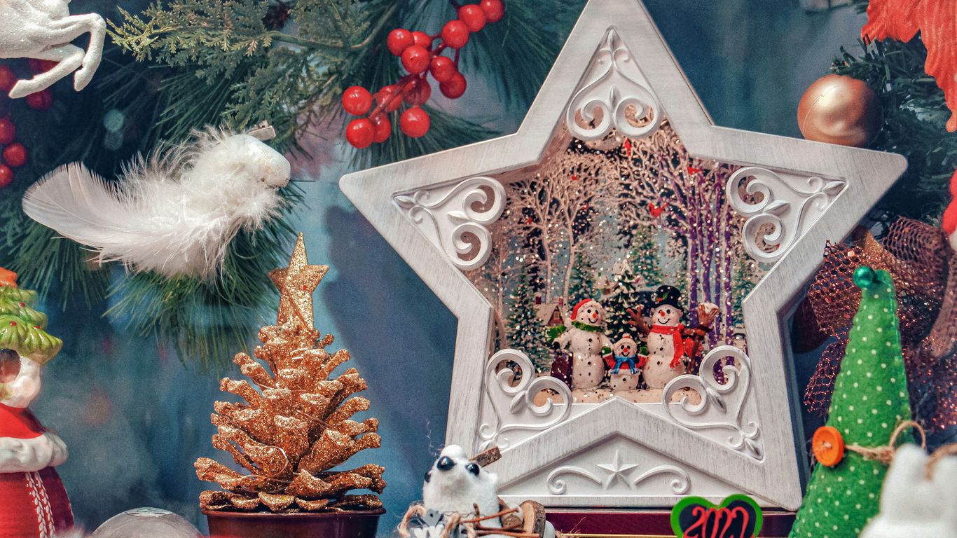 a christmas scene with a star and other decorations