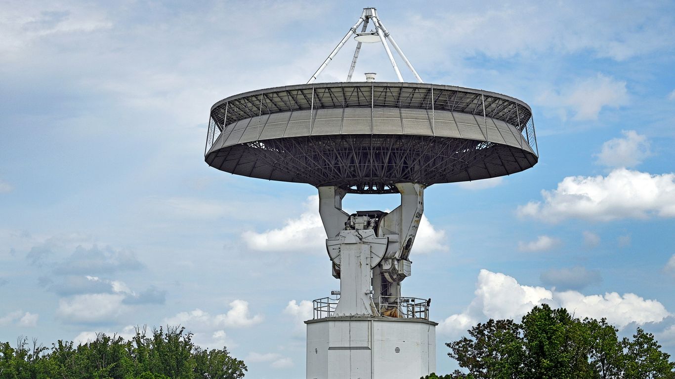 Large radio telescope against a cloudy sky