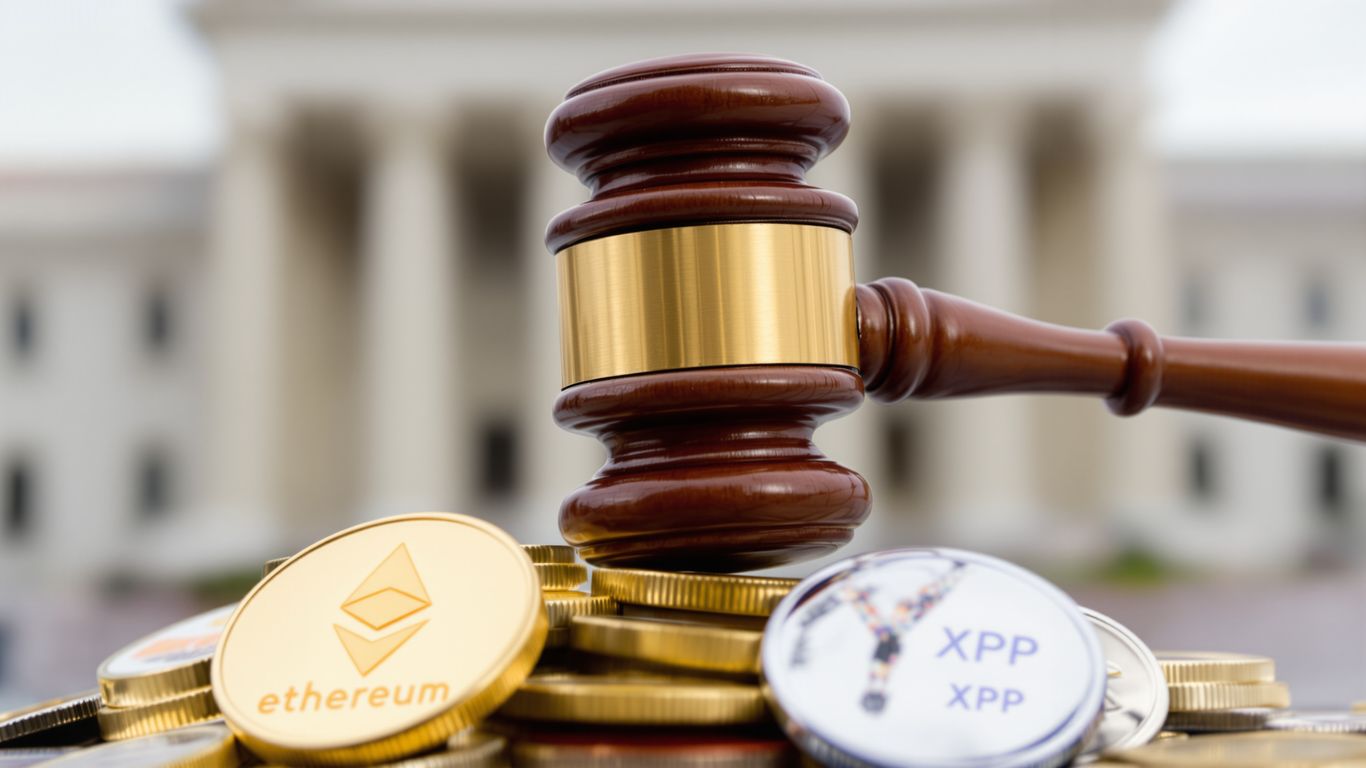 Gavel hitting crypto coins, SEC building background.