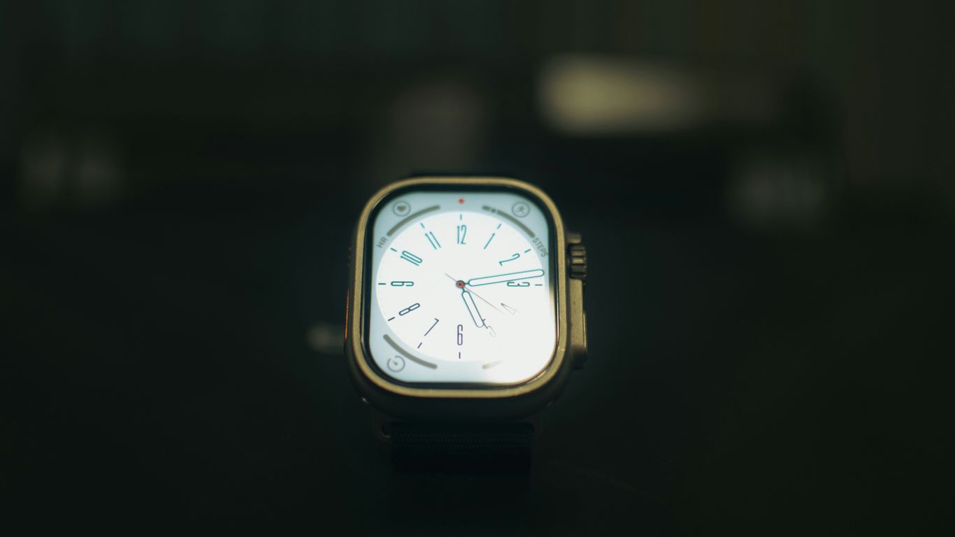 a close up of a watch on a table