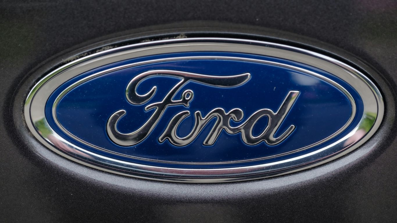 a close up of a ford emblem on a car