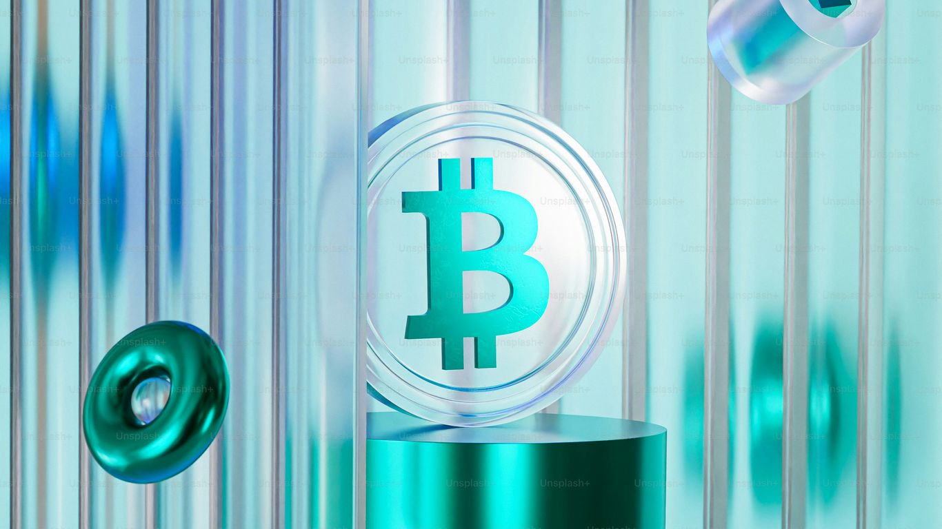 Crypto elements with a Bitcoin symbol and geometric shapes.