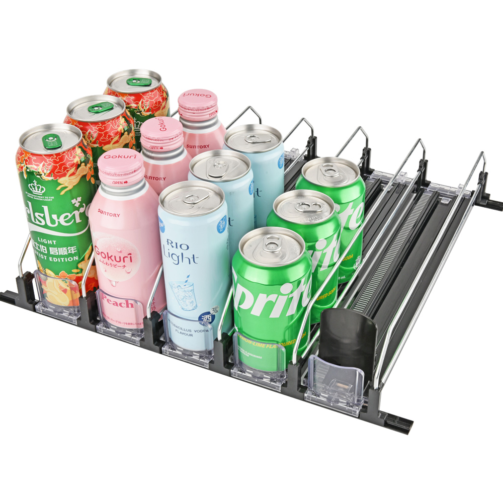 An Avantco pusher-glide organizer with spring-loaded paddles neatly arranging cans on a flat shelf.