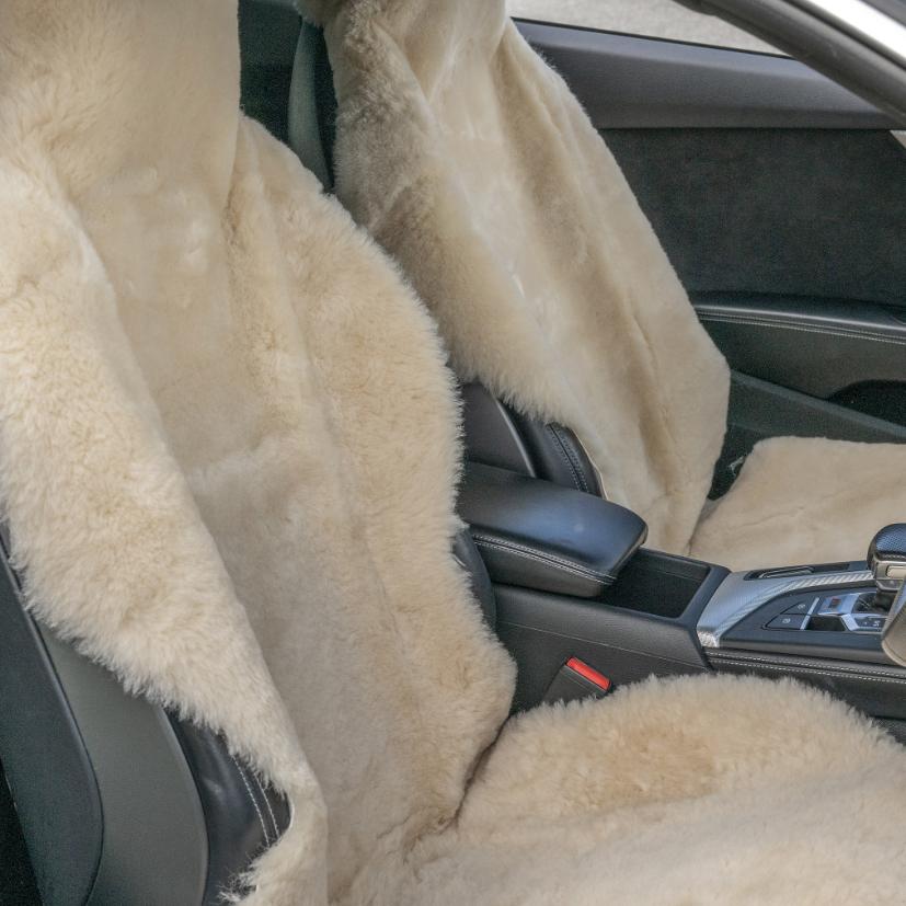 Short wool honey sheepskin car seat covers installed in a vehicle