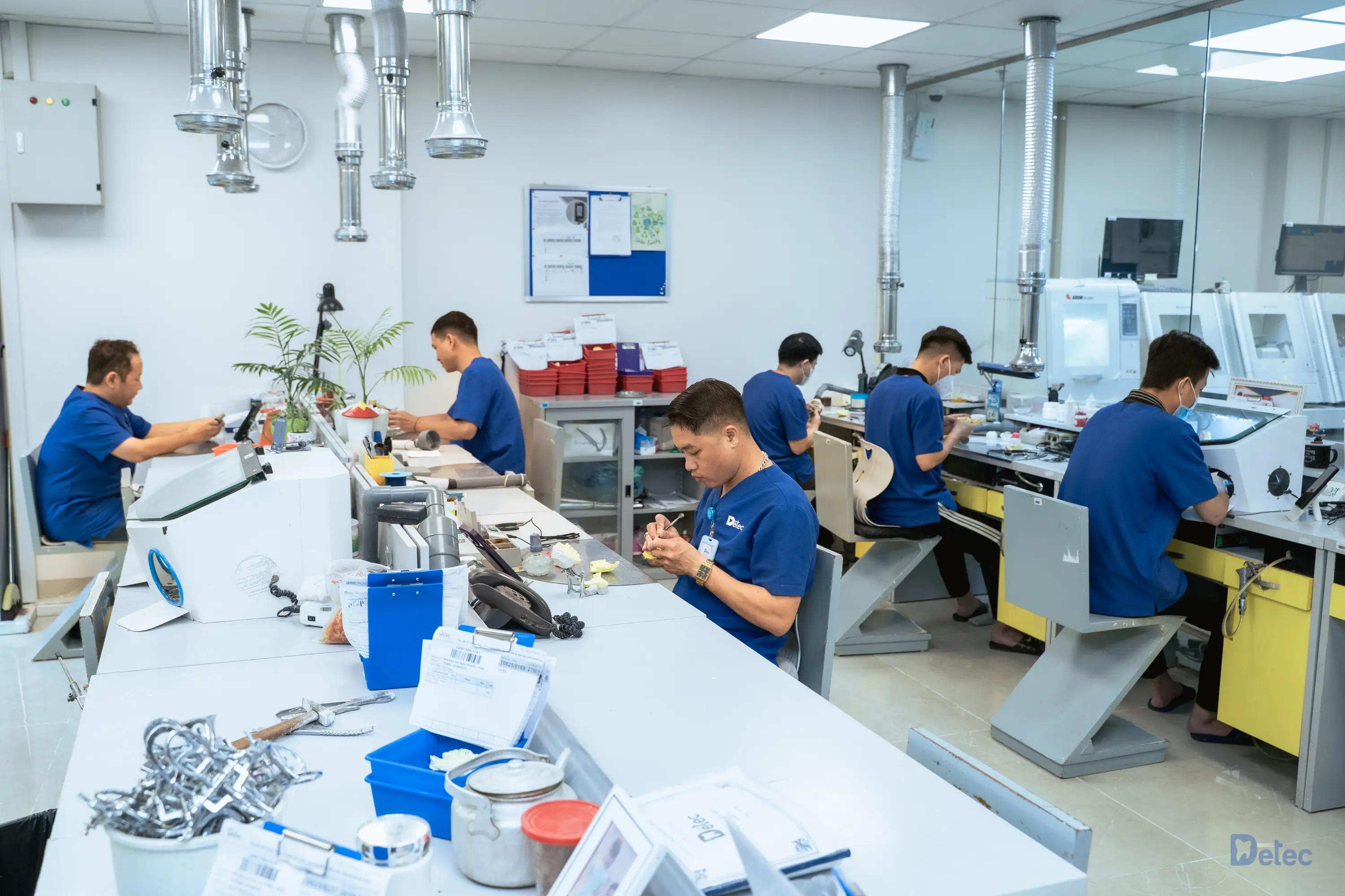 Technician reviewing laboratory quality controls