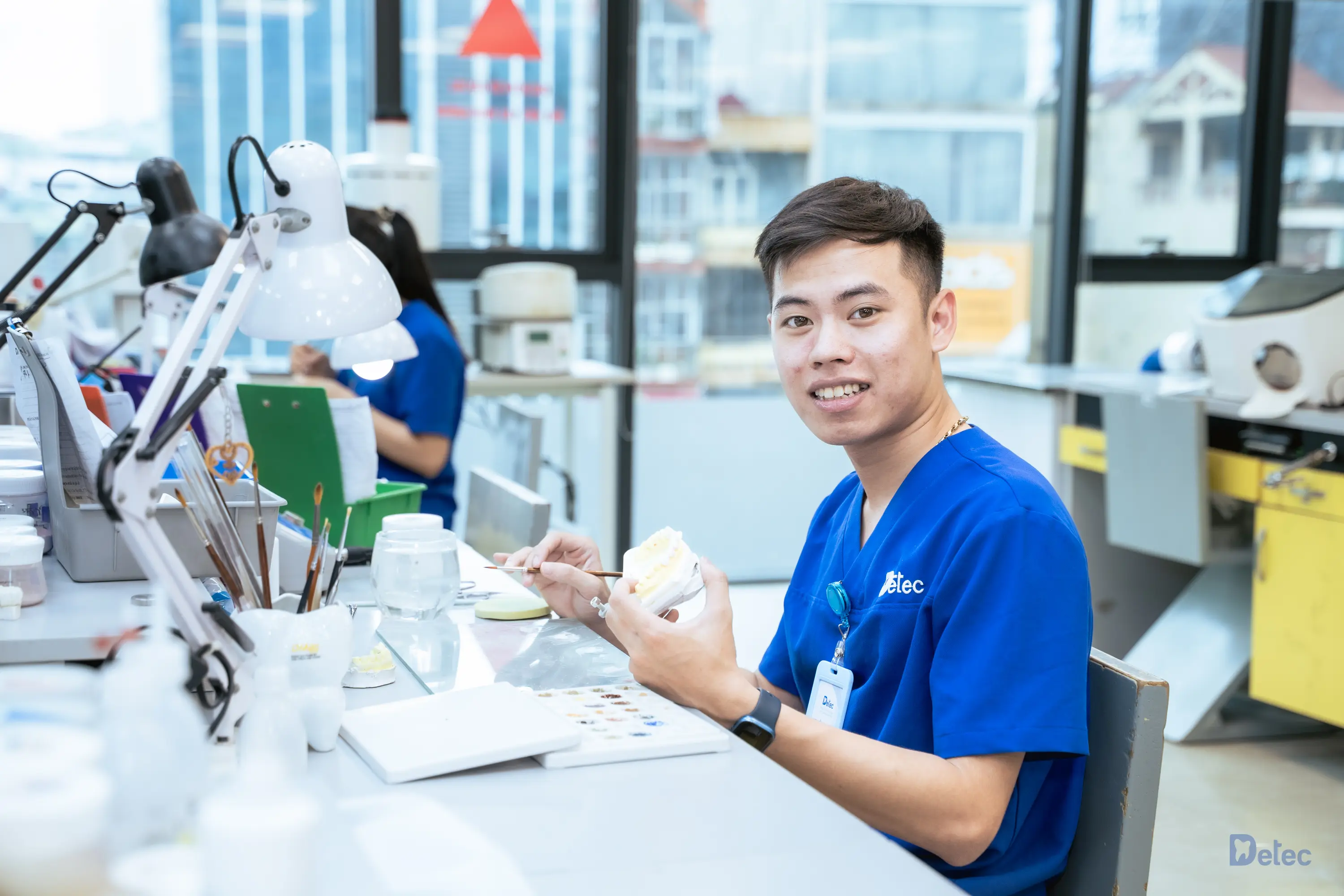 A technician working on a dental prosthesis